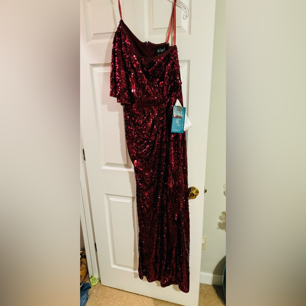 Max Duggal sequin high slit one shoulder gown. Burgundy. Size 2. New with tags.